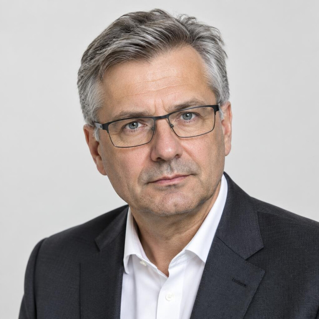 Czech male news director portrait with glasses